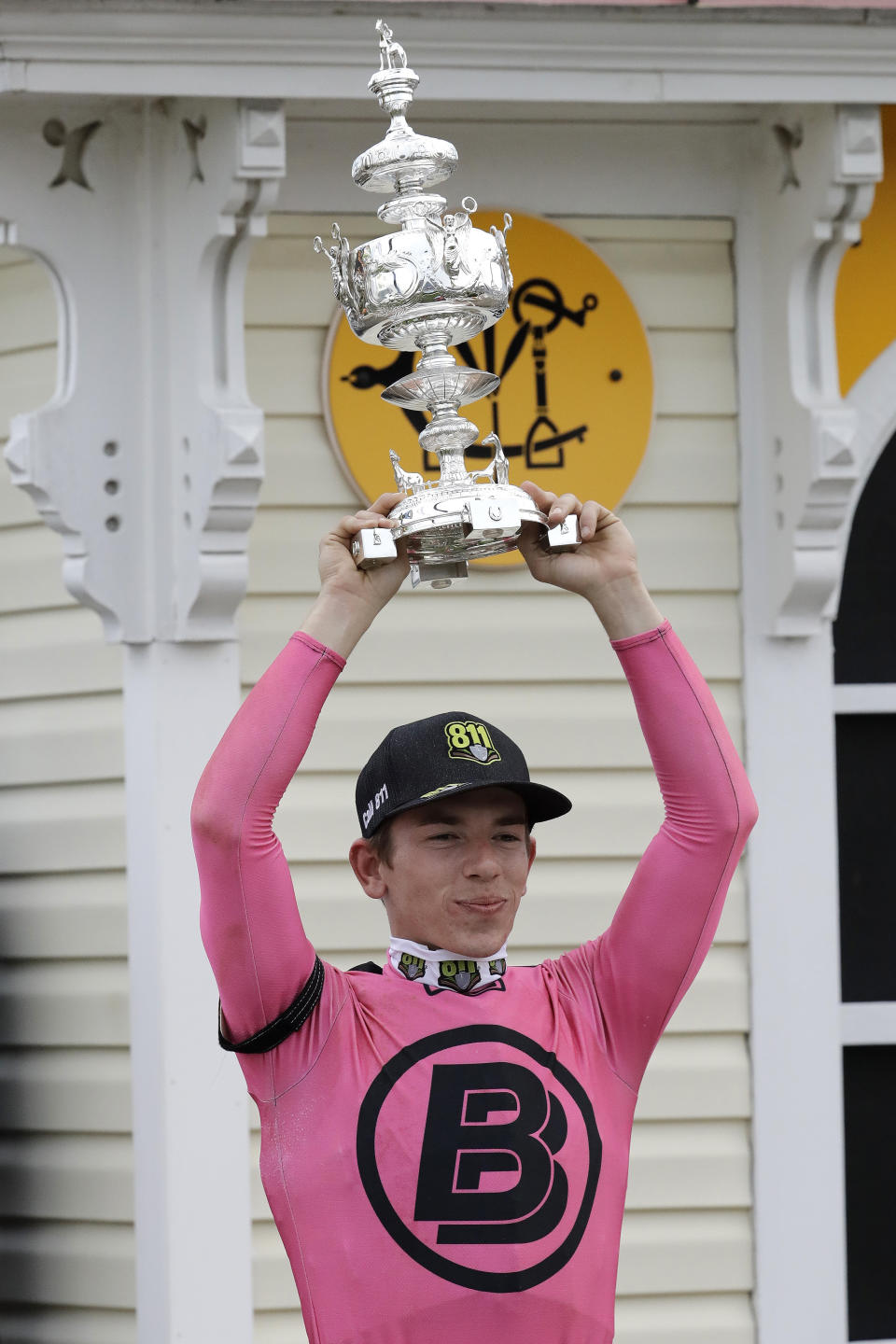 Tyler Gaffalione holds the Woodlawn Vase after riding War of Will to a win during the 144th Preakness Stakes horse race at Pimlico race course, Saturday, May 18, 2019, in Baltimore. (AP Photo/Steve Helber)
