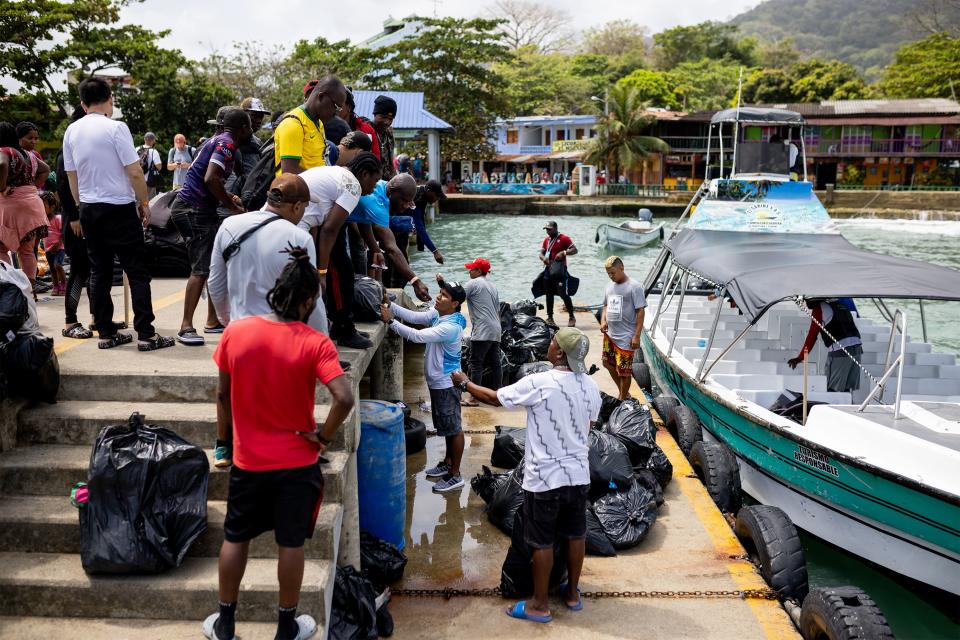 Migrants arrive in Capurganá after crossing from Necoclí. | Spenser Heaps, Deseret News