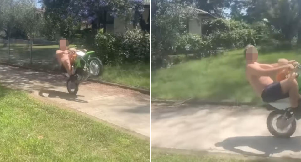 Screenshot of a video showing a man on a green two wheel motorbike on a foot path with a small child sitting in front of him.