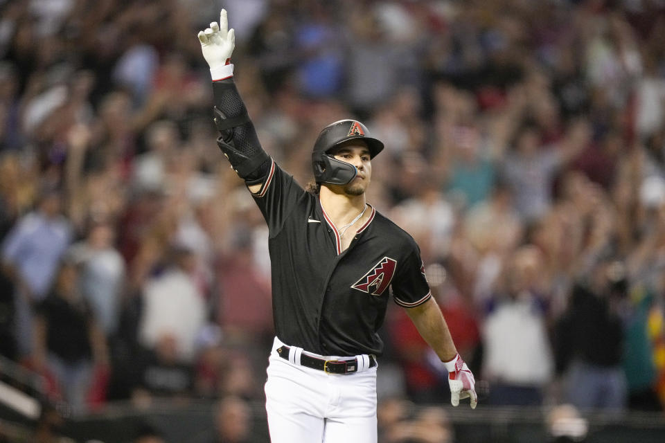 Arizona Diamondbacks' Alek Thomas rounds the bases after a two-run home run against the Philadelphia Phillies during the eighth inning in Game 4 of the baseball NL Championship Series in Phoenix, Friday, Oct. 20, 2023. (AP Photo/Brynn Anderson)