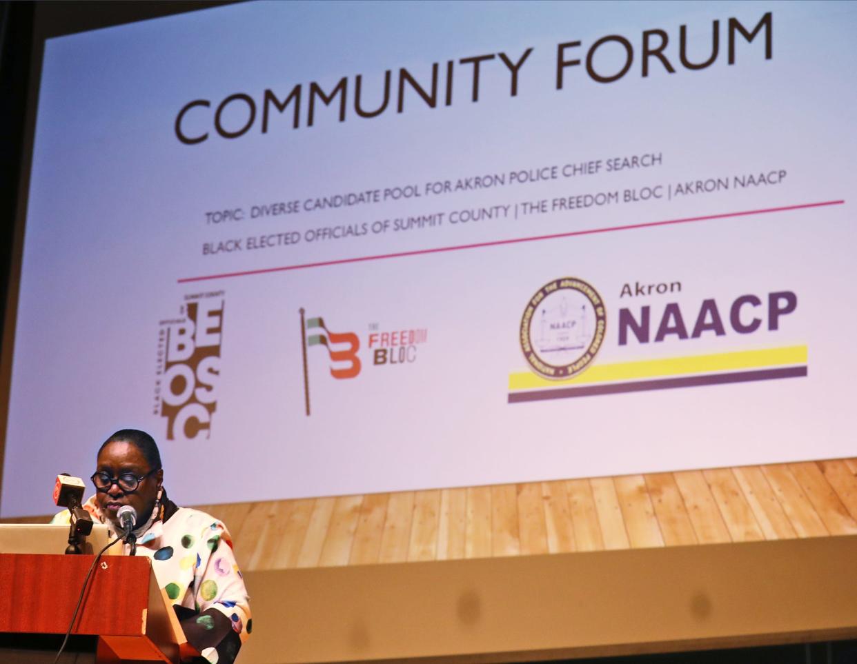 Linda Omobien, at-large Akron City Councilwoman and president of the Black Elected Officials of Summit County, speaks Tuesday evening at the start of a community forum focusing on the search for a new police chief.