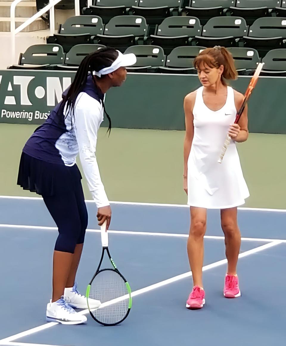 Tammy Simone, a long-time USTA official, participates in a clinic with tennis great Venus Williams.