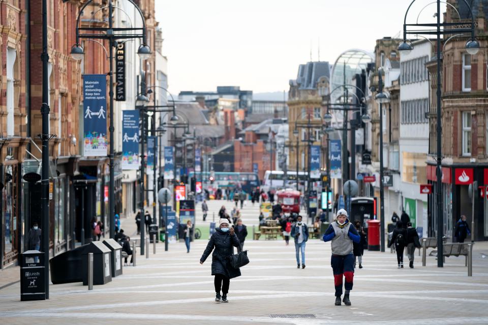 LEEDS, Nov. 5, 2020 -- People walk through the city centre of Leeds, in Britain, on Nov. 5, 2020.   England entered a month-long lockdown Thursday to quell the resurgence of coronavirus. (Photo by Jon Super/Xinhua via Getty) (Xinhua/Jon Super via Getty Images)