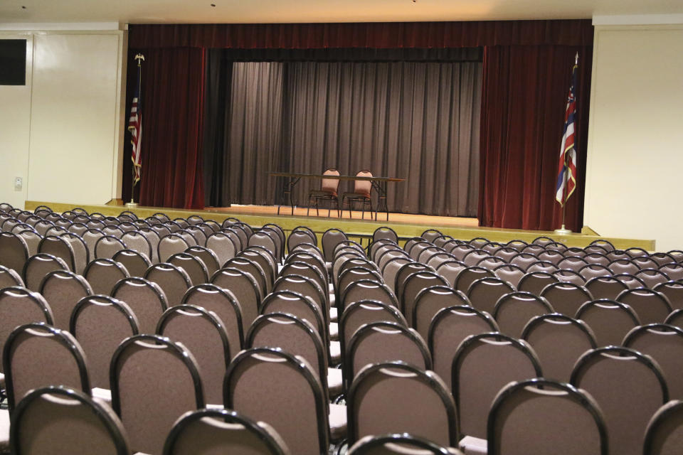 In this Thursday, May 7, 2019 photo shows an empty room at the Neal Blaisdell Center in Honolulu as officials get ready to use of the large event venue for jury selection in a corruption case involving the highest levels of the city's law enforcement. The U.S. judge presiding of the case against former police chief Louis Kealoha and his wife Katherine Kealoha, a former deputy city prosecutor, is concerned the courthouse wouldn't accommodate some 400 jurors needed for the high-profile case, so he reserved a room at the center. (AP Photo/Jennifer Sinco Kelleher)
