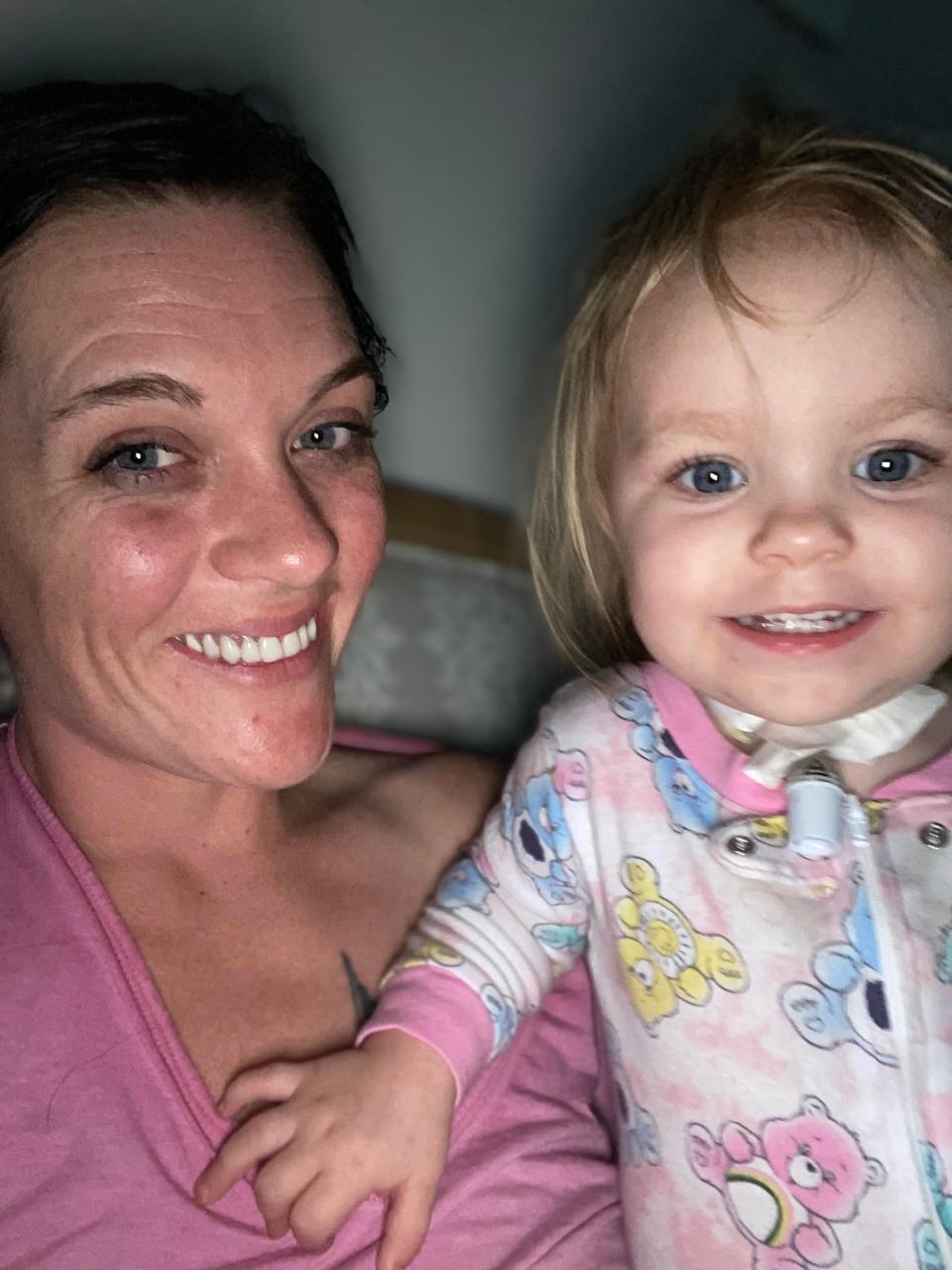 Hannah Lyngar holds her daughter, Hannah. The 1-year-girl, who has complicated medical needs, temporarily lost her TennCare coverage this year when her redetermination application got lost in the mail.