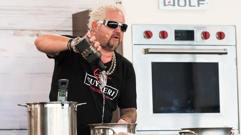 Guy Fieri cooking at public event