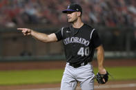 Colorado Rockies relief pitcher Tyler Kinley (40) points to catcher Elias Diaz after the final out of the ninth inning in a baseball game against the San Francisco Giants on Monday, Sept. 21, 2020, in San Francisco. Colorado won 7-2. (AP Photo/Tony Avelar)