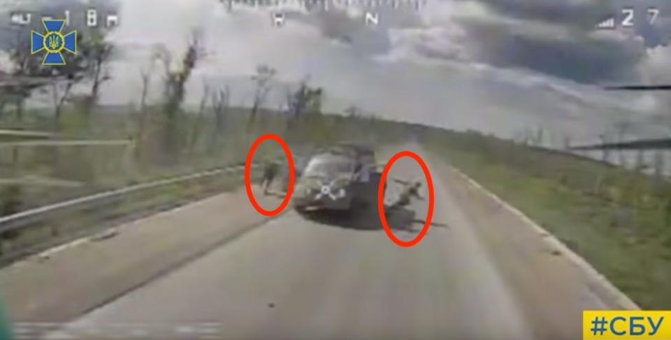 A Ukrainian exploding drone about to hit a Russia truck in a video published by security services.