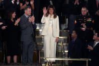 <p>The first lady arrived for the State of the Union address in an outfit reminiscent of former FLOTUS and presidential candidate Hillary Clinton. The <a rel="nofollow" href="https://au.be.yahoo.com/hidden-meaning-behind-melania-trumps-white-pantsuit-at-sotu-38792300.html" data-ylk="slk:cream-colored Christian Dior pantsuit;elm:context_link;itc:0;sec:content-canvas;outcm:mb_qualified_link;_E:mb_qualified_link;ct:story;" class="link  yahoo-link">cream-colored Christian Dior pantsuit</a> was also evocative of the Suffragettes. (Photo: Getty Images) </p>