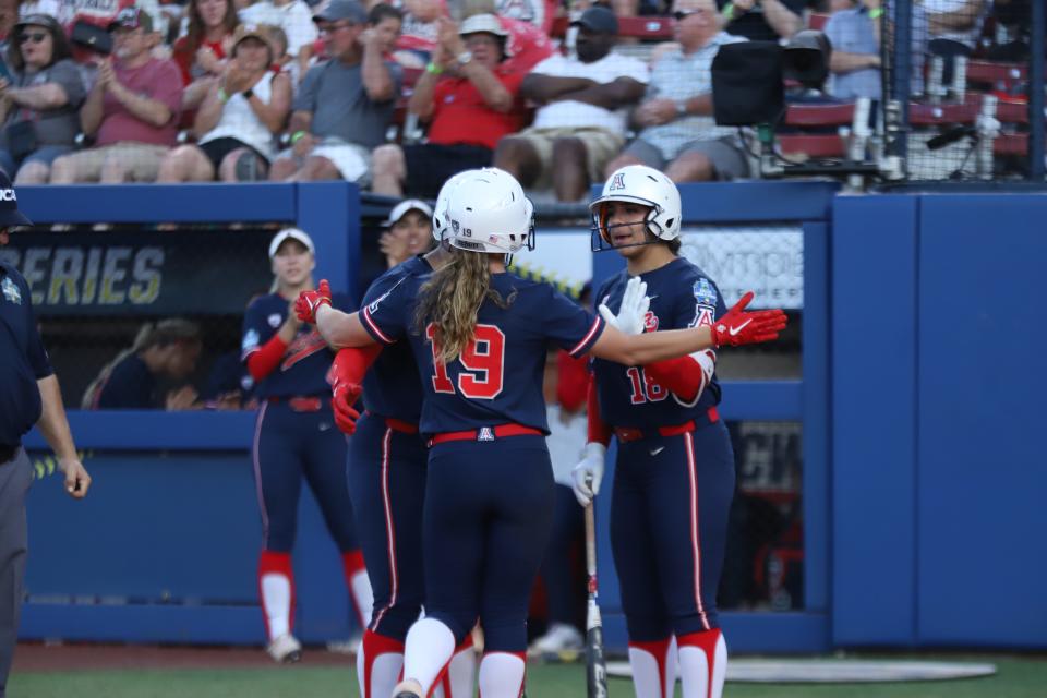 Arizona's Jessie Harper (No. 19) comes to home. Alabama softball defeated the Arizona Wildcats 5-1 at the Women's College World Series in Oklahoma City on Thursday, June 3, 2021.
