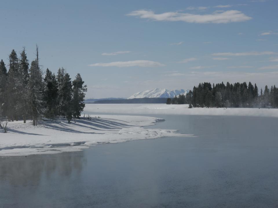 Yellowstone Lake outlet during winter in Yellowstone National Park.