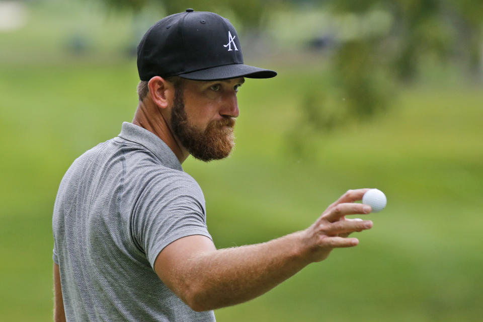 Kevin Chappell tips his ball to the crowd on the ninth hole during the second round of A Military Tribute at The Greenbrier golf tournament in White Sulphur Springs, W.Va., Friday, Sept. 13, 2019. (AP Photo/Steve Helber)