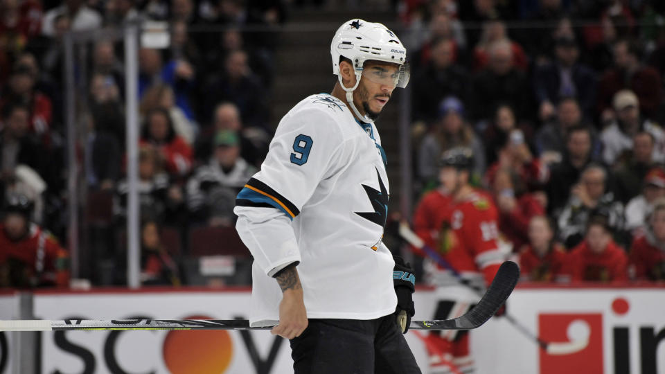 FILE - In this March 11, 2020 file photo, San Jose Sharks' Evander Kane (9) looks on during the first period of an NHL hockey game against the Chicago Blackhawks in Chicago. The predominantly white sport of hockey has a checkered history of racism and a culture of not standing out from the team or speaking out. The death of George Floyd in Minnesota has shattered that silence. (AP Photo/Paul Beaty, File)