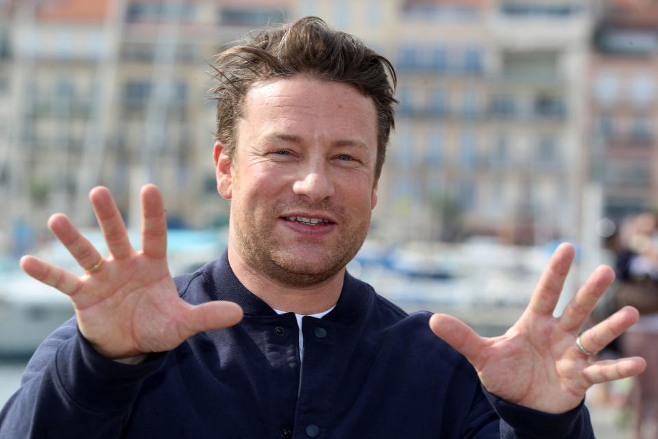 British chef and activist Jamie Oliver, poses during a photocall for a TV serie "Jamie Oliver" as part of the MIPCOM, the world's biggest television and entertainment market, on October 15, 2018 in Cannes, southeastern France. (Photo by VALERY HACHE / AFP)        (Photo credit should read VALERY HACHE/AFP/Getty Images)