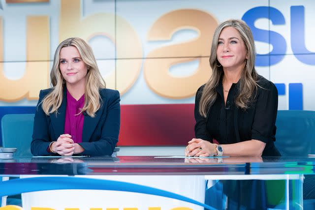 <p>Apple TV+</p> Reese Witherspoon and Jennifer Aniston play co-anchors on AppleTV+'s 'The Morning Show.'