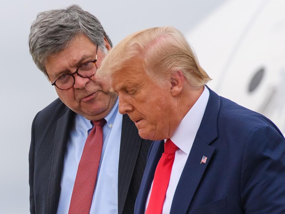 US President Donald Trump (R) and US Attorney General William Barr step off Air Force One upon arrival at Andrews Air Force Base in Maryland on September 1, 2020