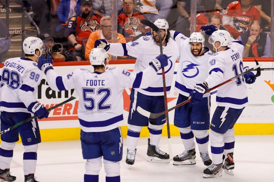 May 17, 2022; Sunrise, Florida, USA; Tampa Bay Lightning left wing Pierre-Edouard Bellemare (41) celebrates with teammates after scoring during the third period against the Florida Panthers in game one of the second round of the 2022 Stanley Cup Playoffs at FLA Live Arena. Mandatory Credit: Sam Navarro-USA TODAY Sports