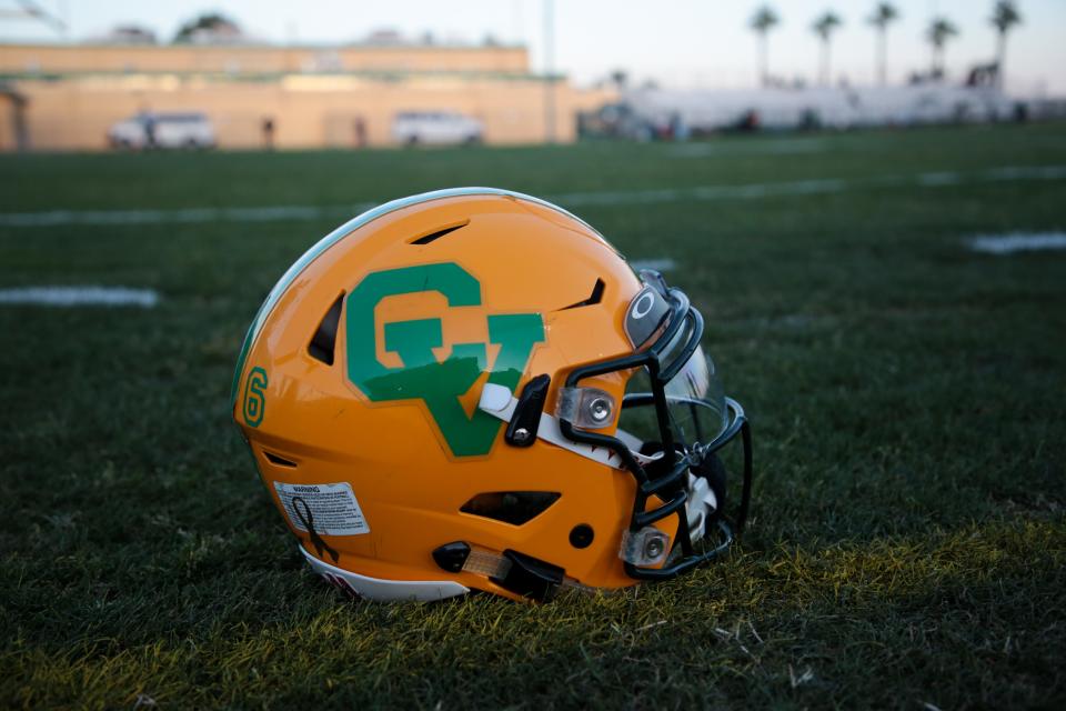 A Coachella Valley football helmet sits on the sidelines on Friday, March 26, 2021, in Thermal, Calif. 