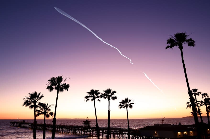 SpaceX Falcon 9 rocket launching 22 Starlink satellites into space, seen from San Clemente, California.