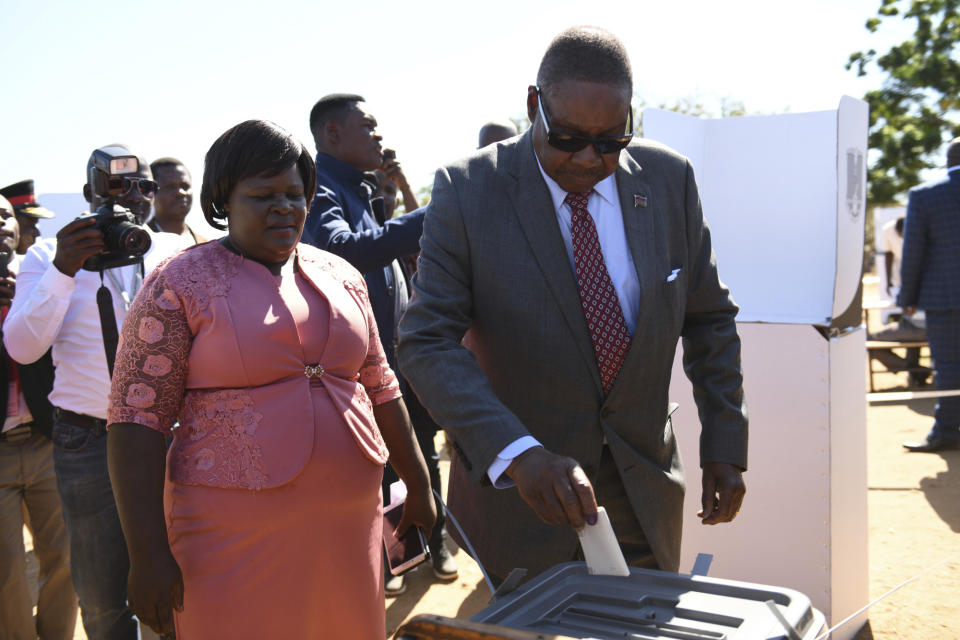 Malawi's President Peter Mutharika casts his vote at a polling station near Blantyre, Malawi, Tuesday, May 21, 2019. More than 6 million Malawians are voting Tuesday for president, parliament and local councils in the country's sixth election since the 1994 end of dictatorship. (AP Photo/Thoko Chikondi)