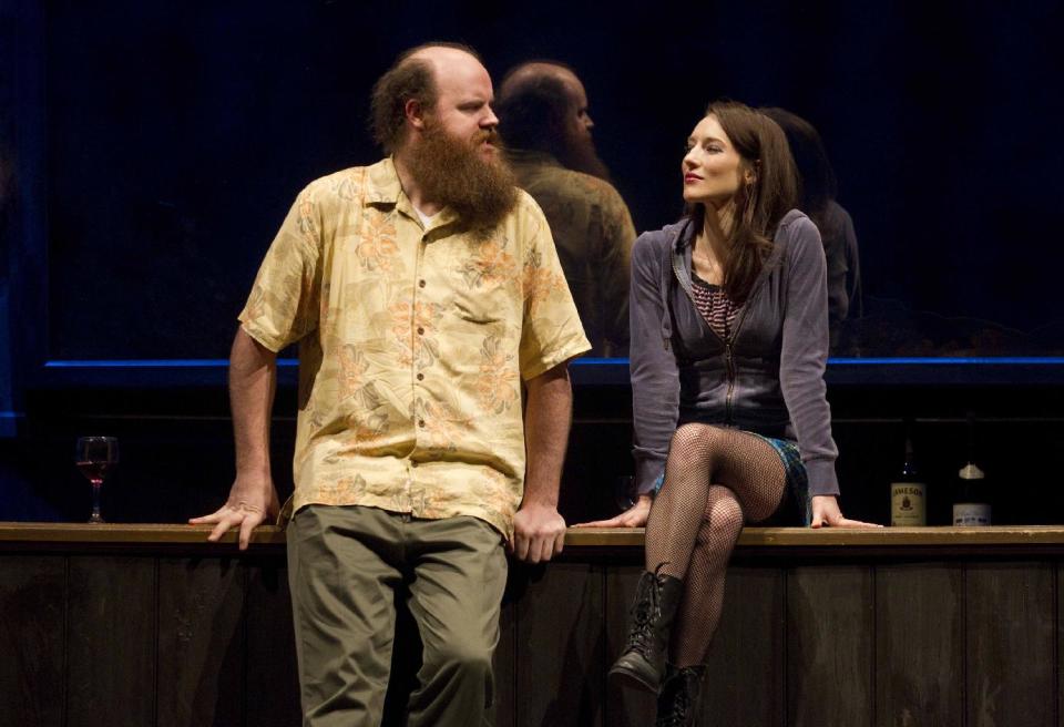 In this theater image released by Boneau/Bryan-Brown, Paul Whitty, left, and Elizabeth A. Davis are shown during a performance of the musical "Once." After years of toil in regional theater and off-Broadway, Davis made her Broadway debut in March in the hit musical "Once" and promptly earned her first Tony Award nomination. Davis was nominated for best featured actress in a musical. The Tony Awards will be broadcast live on CBS on June 10. (AP Photo/Boneau/Bryan-Brown, Joan Marcus)