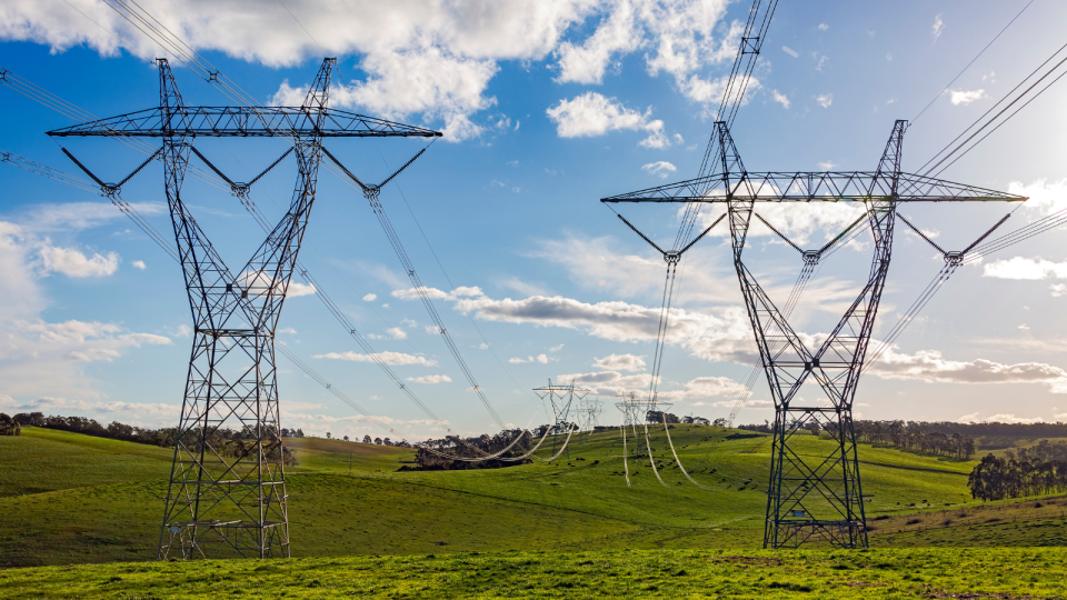 Energy power lines in an open field