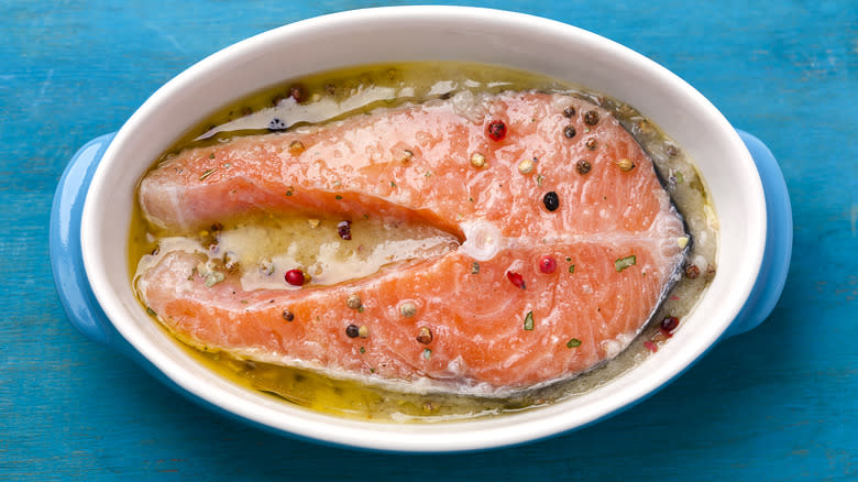 Salmon marinating in bowl