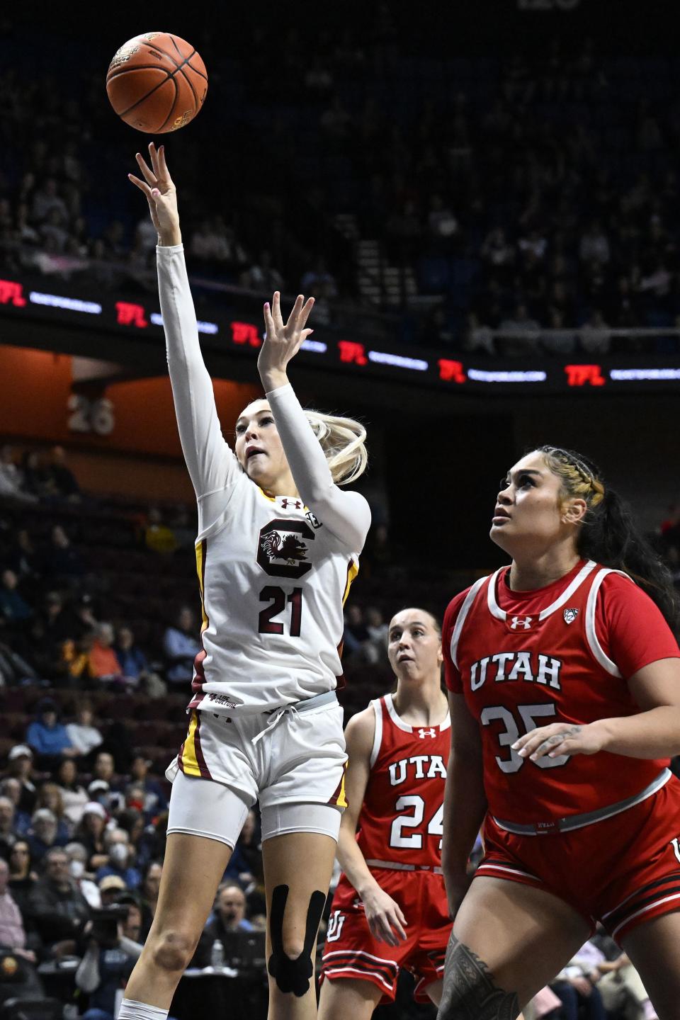 South Carolina forward Chloe Kitts (21) shoots as Utah forward Alissa Pili looks on in the first half of an NCAA college basketball game, Sunday, Dec. 10, 2023, in Uncasville, Conn. | Jessica Hill, Associated Press