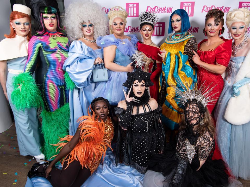 The winner of RuPaul's Drag Race UK season three, Krystal Versace (centre), with the other queens in London in November 2021..