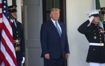 U.S. President Trump waits to welcome Pakistan’s Prime Minister Khan at the White House in Washington