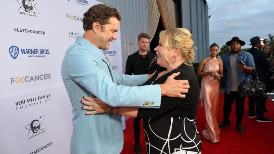 Joshua Jackson and Julie Plec attend the Barbara Berlanti Heroes Gala Benefitting Fuck Cancer at Barker Hangar on October 01, 2022 in Santa Monica, California.