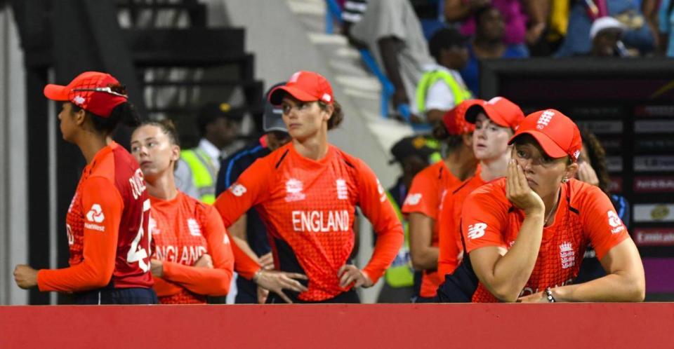 England's women look on, dejected, as Australia win the World Cup (Getty)