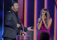 Lee Brice, left, and Carly Pearce accept the award for single of the year for "I Hope You're Happy Now" at the 56th annual Academy of Country Music Awards on Sunday, April 18, 2021, at the Grand Ole Opry in Nashville, Tenn. (AP Photo/Mark Humphrey)