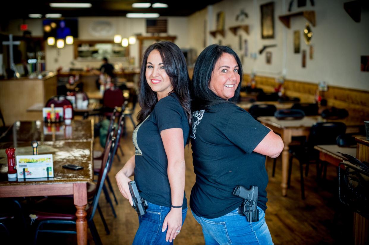 Owner Lauren Boebert, left, poses for a portrait with her mother, Shawna Bentz, at Shooters Grill in Rifle, Colorado on April 24, 2018.