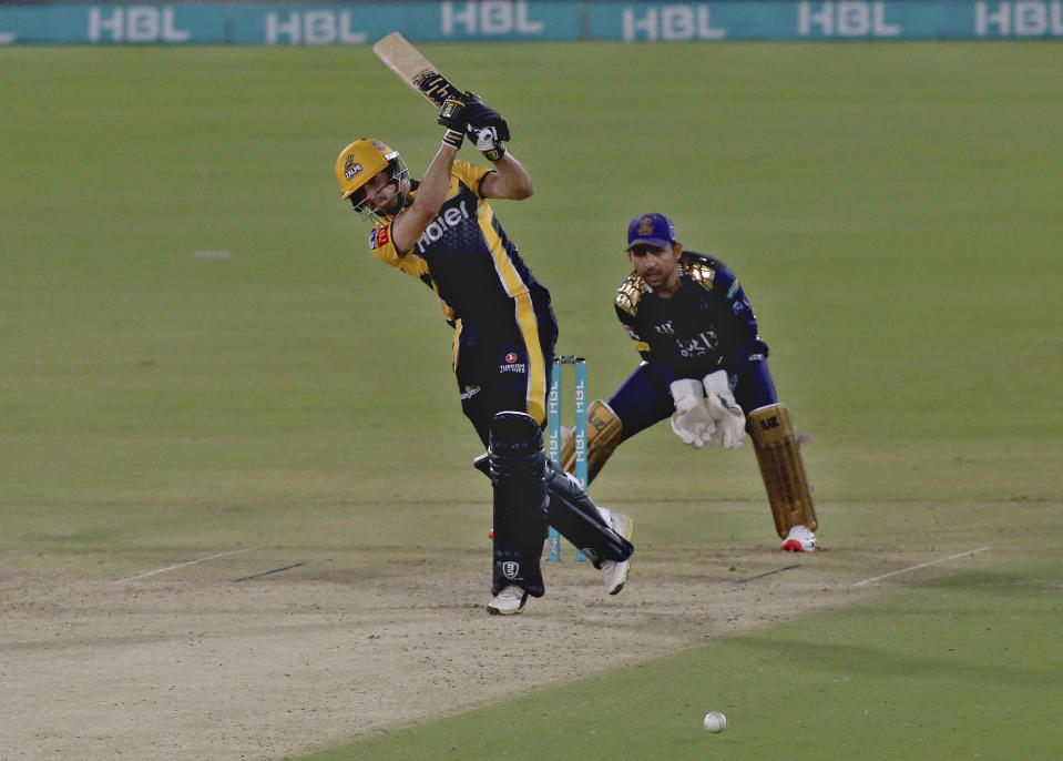 Peshawar Zalmi' Haider Ali plays a shot during a Pakistan Super League T20 cricket match between Quetta Gladiators and Peshawar Zalmi at the National Stadium, in Karachi, Pakistan, Friday, Feb. 26, 2021. (AP Photo/Fareed Khan)