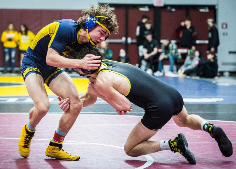 Cowan's Toby Abbott and Delta's Kolten Rhonemus wrestle in the 145 pound weight class during the Delaware County Wrestling Tournament at Wes-Del High School Thursday, Jan. 6, 2022. 