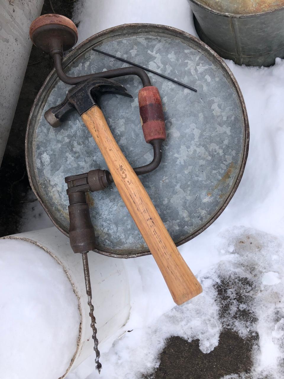 Tools for tapping maple trees sit in the sugar bush last year at Bendix Woods County Park in New Carlisle.