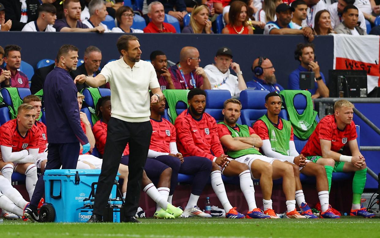 England's substitutes look to Gareth Southgate during the first half