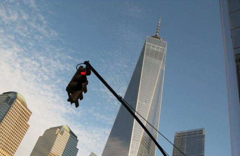 One World Trade Center stands tall above other nearby buildings in New York on November 3, 2014