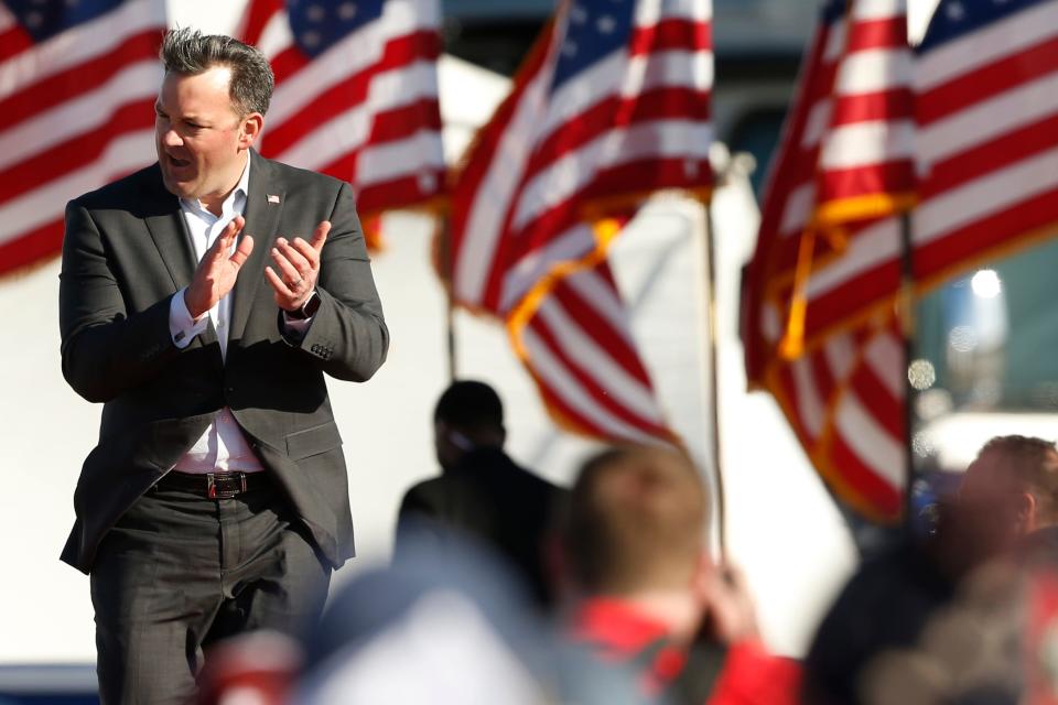 Georgia lieutenant governor candidate Burt Jones takes the stage at a "Save America Rally" at the Banks County Dragway on Saturday, March 26, 2022.