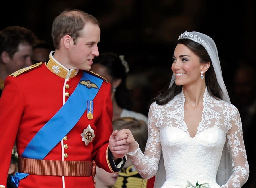 FILE – Britain’s Prince William and his wife Kate, Duchess of Cambridge stand outside of Westminster Abbey after their Royal Wedding in London Friday, April, 29, 2011. (AP Photo/Martin Meissner, File)