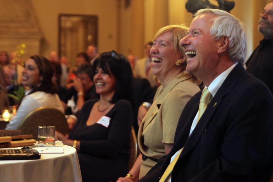 File photo from June 8, 2011, of former Mayor Don Slesnick, front right, cracks up as friends and former commissioners offer humorous suggestions, including an appearance on “Dancing With the Stars” and working for his wife Jeannett, in center, of what the former mayor could do post-politics at a reception at the Biltmore Hotel honoring Slesnick for his service over 10 years as Coral Gables mayor.