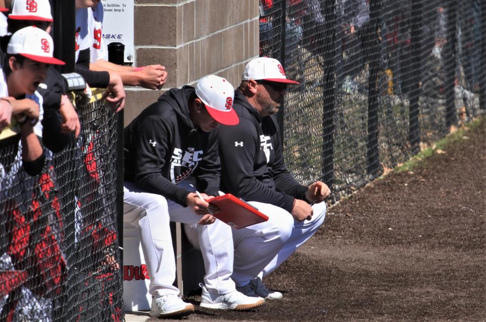 Southern Boone baseball coach Brian Ash (center) looks on during the Eagles' 8-5 win over Mexico on April 8, 2023, in Ashland, Missouri.