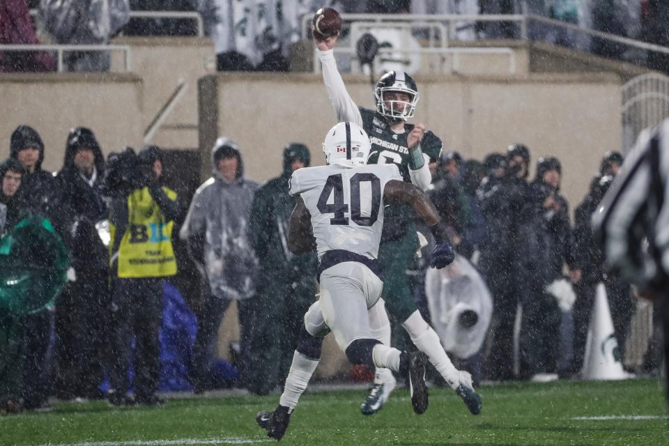 Michigan State quarterback Theo Day passes against Penn State during the second half at Spartan Stadium in East Lansing, Saturday, Oct. 26, 2019.