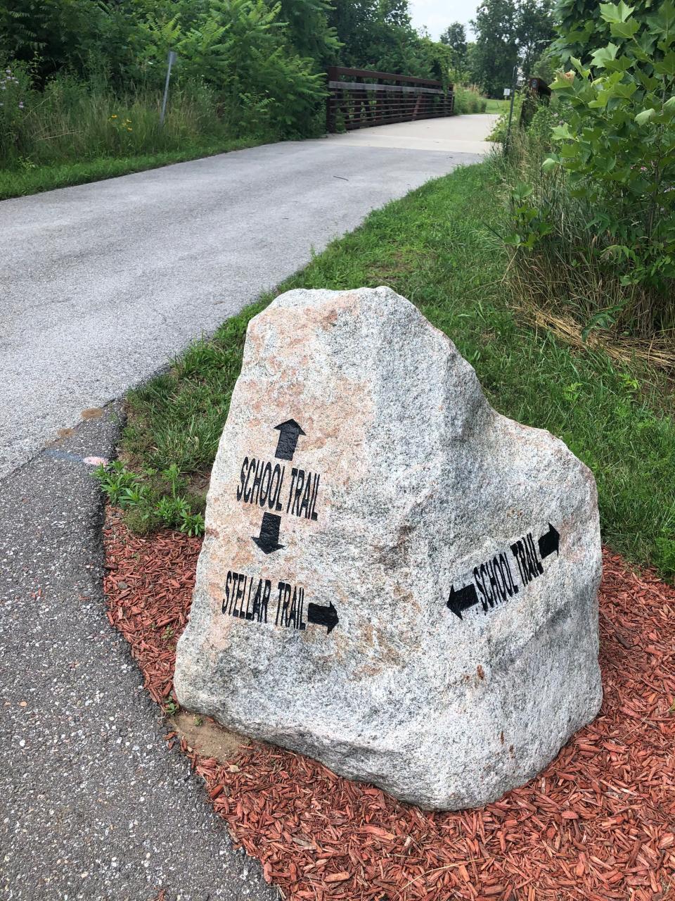 Stones are used to label the trails through North Liberty, as seen on July 11, 2023.