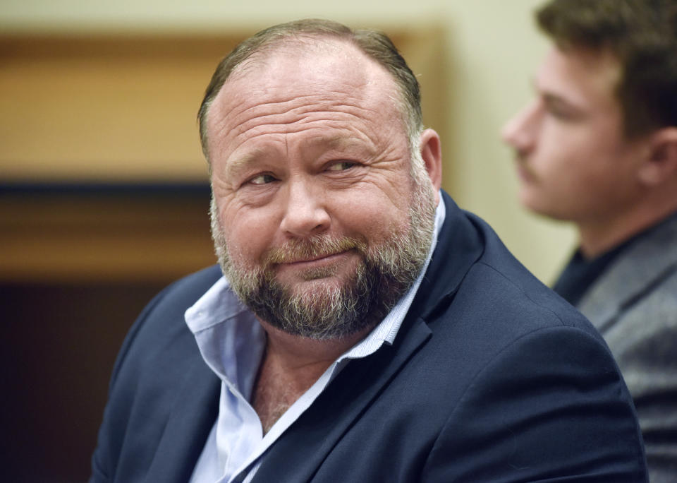 FILE - Infowars founder Alex Jones appears in court to testify during the Sandy Hook defamation damages trial at Connecticut Superior Court in Waterbury, Conn., on Sept. 22, 2022. A bank recently shut down the accounts of Jones' media company citing unauthorized transactions — a move that caused panic at the business when its balances suddenly dropped from more than $2 million to zero, according to a bankruptcy lawyer for the company. (Tyler Sizemore/Hearst Connecticut Media via AP, Pool, File)