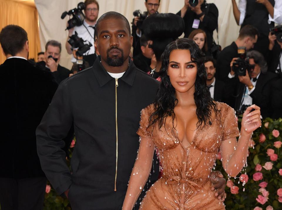 Kim Kardashian and Kanye pose for photos at the Met Gala