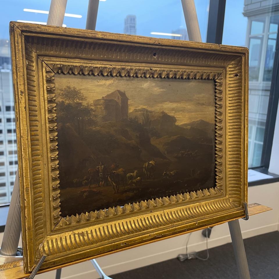 This photo shows the 18th century painting titled "Landscape of Italian Character" by Vienna-born artist Johann Franz Nepomuk Lauterer, Thursday, Oct. 19, 2023 in Chicago. After going missing nearly 80 years ago, the "Landscape of Italian Character", a baroque landscape painting was returned to a German museum representative in a brief ceremony at the German Consulate in Chicago, where the pastoral piece of an Italian countryside was on display. (AP Photo/Claire Savage)