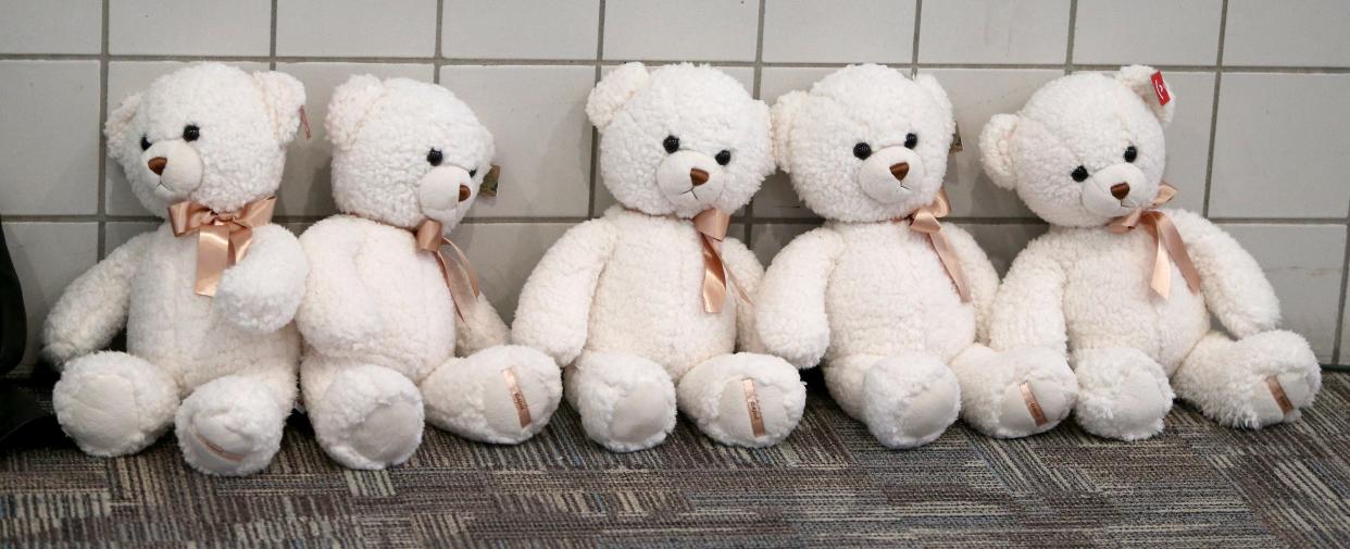 Five of the teddy bears to be donated to area hospitals are shown on Nov. 28, Giving Tuesday, in a display at an Indiana airport.