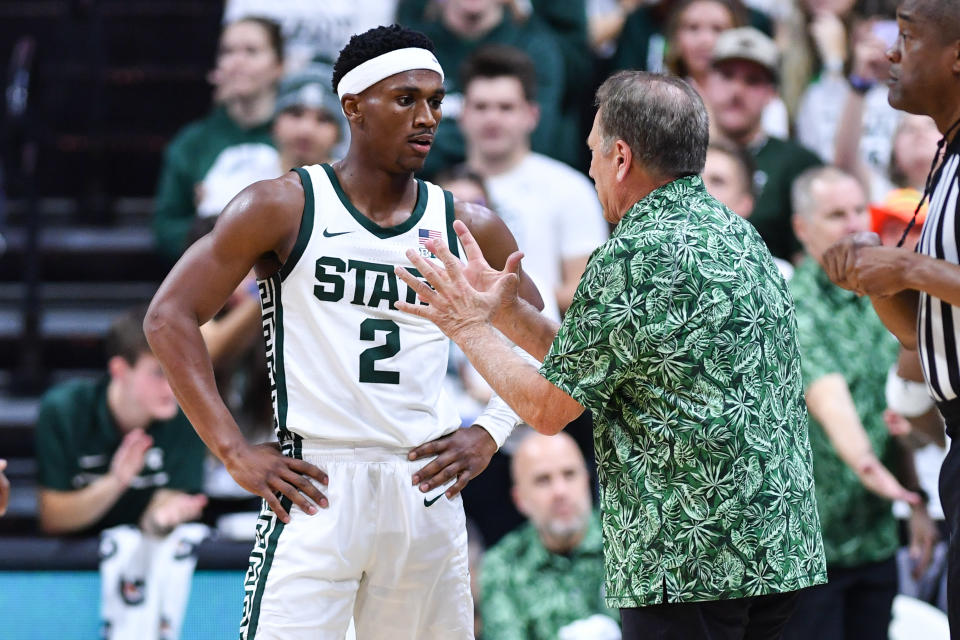 EAST LANSING, MI - OCTOBER 29: Michigan State Spartans guard Tyson Walker (2) listens to instruction from head coach Tom Izzo during a college basketball exhibition game between the Michigan State Spartans and Tennessee Volunteers on October 29, 2023 at the Breslin Center in East Lansing, MI. (Photo by Adam Ruff/Icon Sportswire via Getty Images)